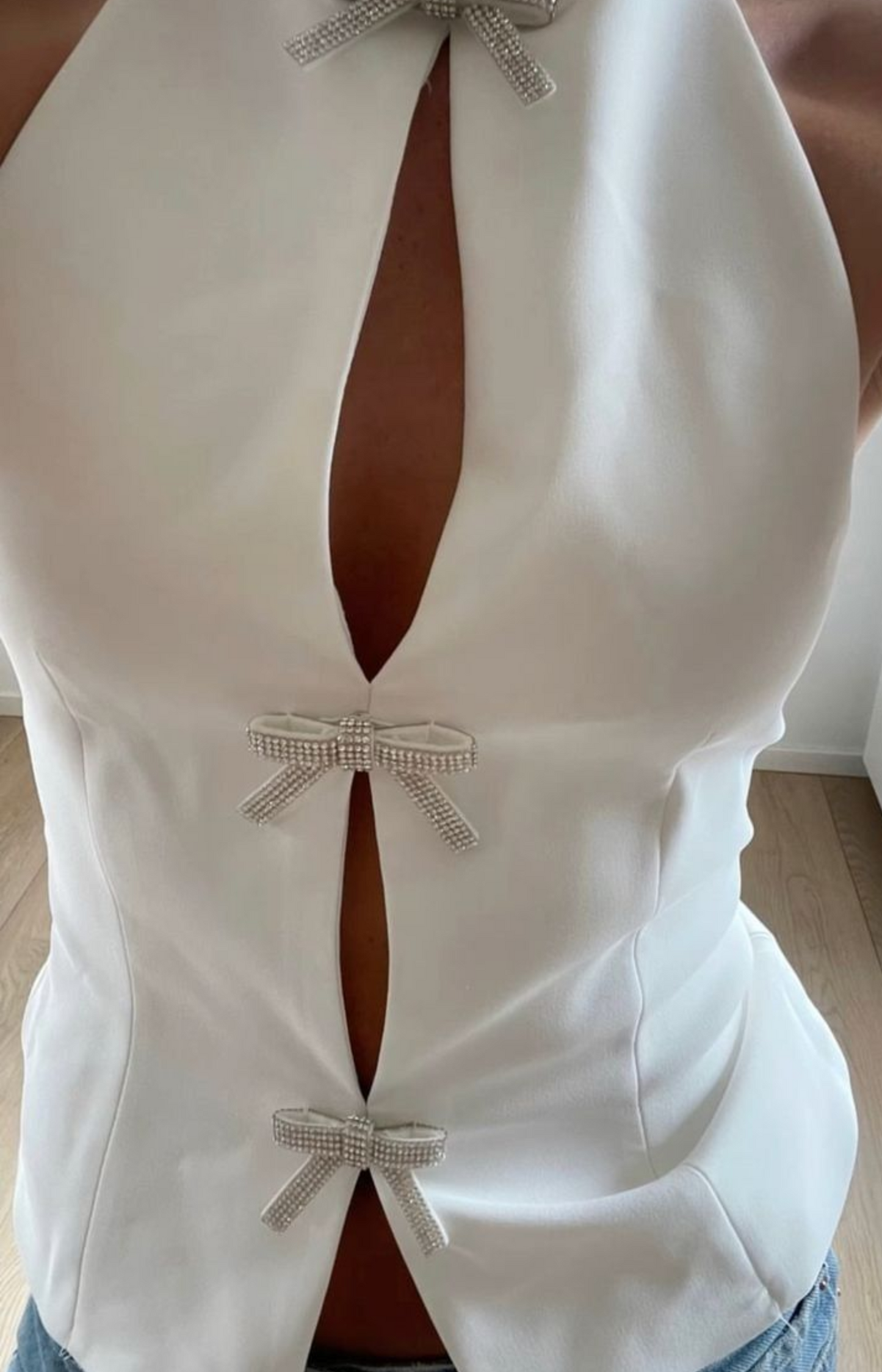 GLIMMER TOP MIT SCHLEIFEN