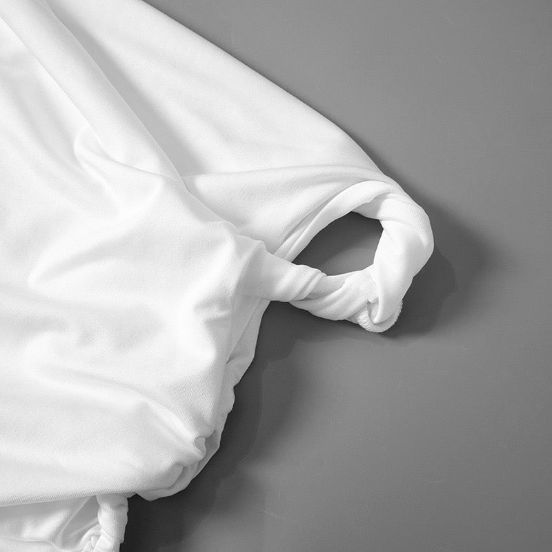 CROP-TOP MIT EINEM SCHULTERTRÄGE